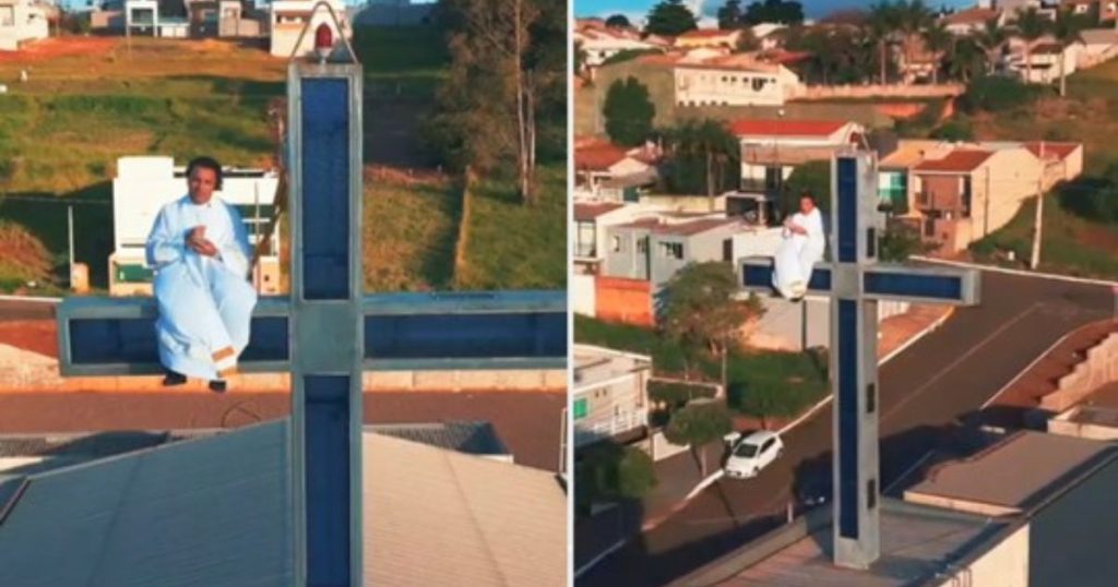 Padre sobe em cruz de 30 metros para convidar fiéis para festa religiosa no Paraná