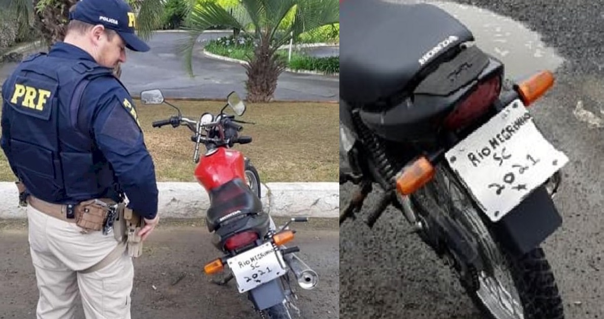 Motociclista pinta placa de moto à mão e é multado