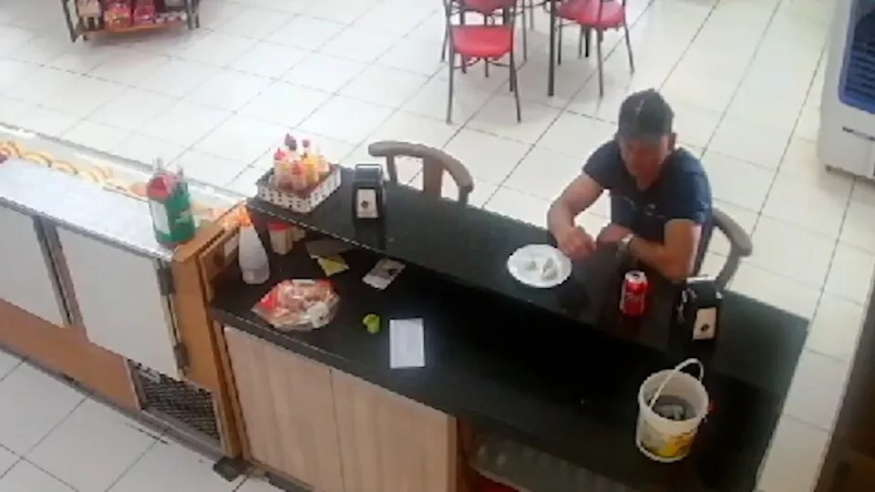 Assista: homem que matou família fazia lanche quando foi preso no Paraná