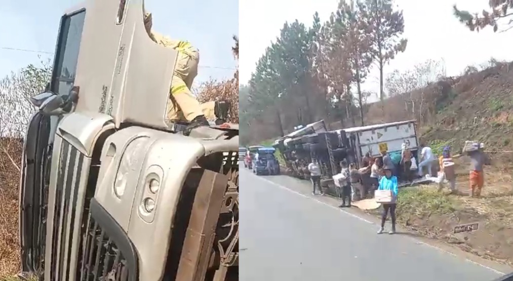 Motorista fica ferido em tombamento de carreta na BR-476; Populares armados com paus, pedras e machado saqueiam carga