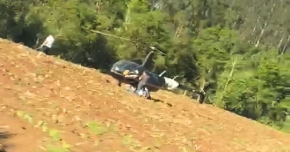 Helicóptero realiza pouso forçado após enroscar em cabos de energia em Cruz Machado